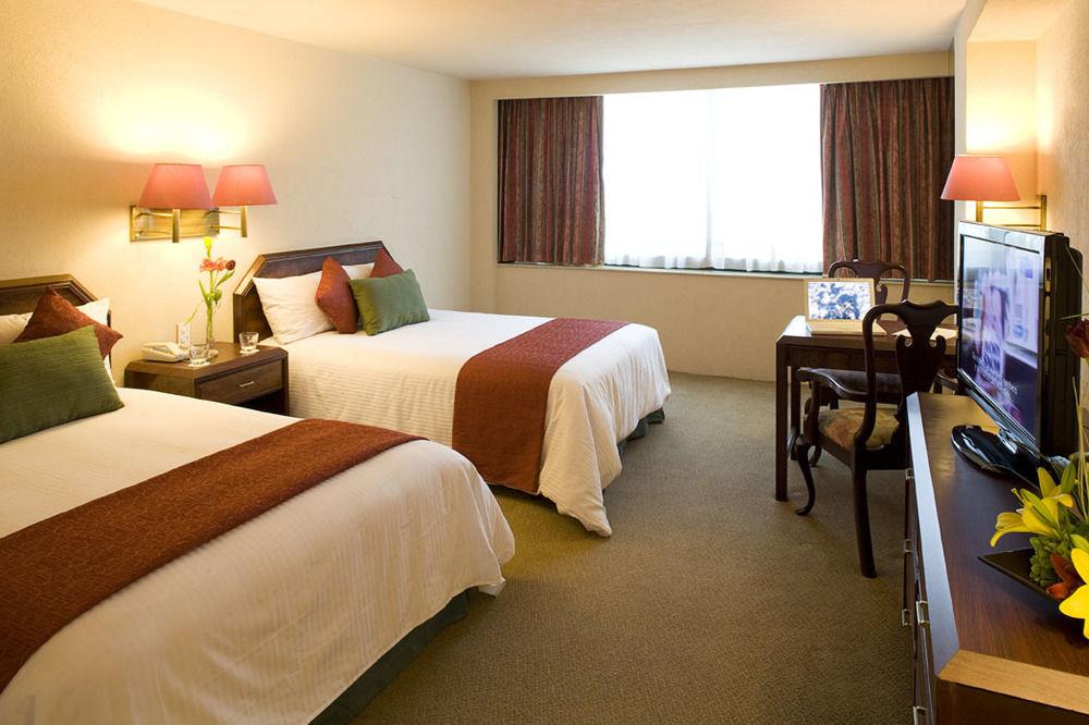 Hotel La Joya Pachuca Exterior foto A typical room at the hotel