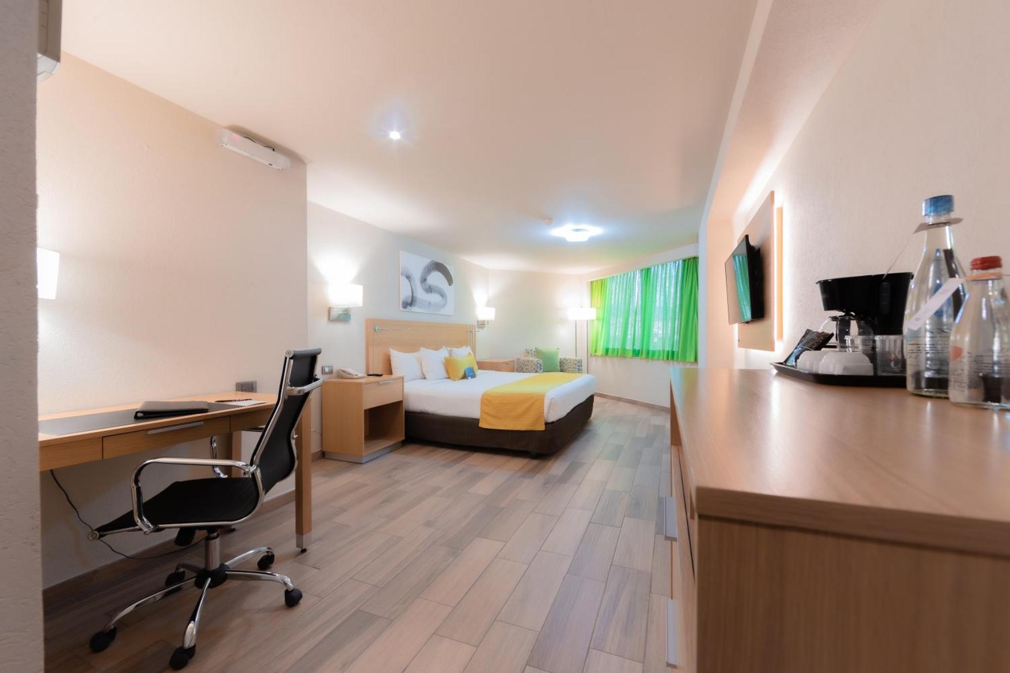 Hotel La Joya Pachuca Exterior foto A typical room at the hotel
